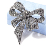 Bow brooch gold or silver plated stunning diamonte designer celebrity pin u9 new