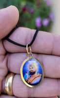 Sikh Guru Nanak Ji Guru Gobind Singh Oval Pendant in Black Evil Shield Thread MM